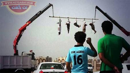 آویزان کردن جنازه های بی سر بعد از گردن زدن در عربستان +18